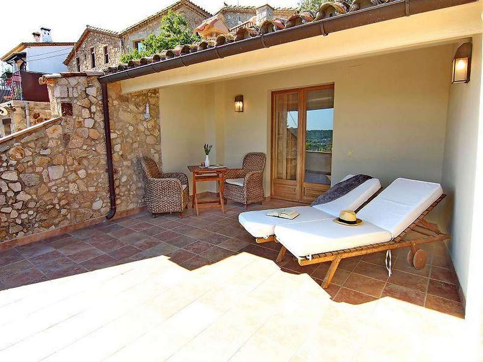 Masia amb 4 dormitoris  terrasses amb vistes al mar i un gran jardí amb piscina a Platja d'Aro